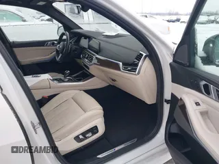 2020 BMW X5 M50i with VIN 5UXJU4C09LLE45658, listed as a IAAI auction lot 41307154 with 69,936 mi miles and . Bid and sale history available at DreamBid. Image 5.