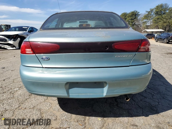 1999 Ford Escort SE с VIN 1FAFP13P4XW252433, выставлен на аукционе Copart как лот 47304895 с пробегом 82 169 миль миль и Чистый • Clean title. История ставок и продаж доступна на DreamBid. Изображение 6.