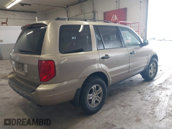 2005 Honda Pilot EX-L with VIN 5FNYF18565B019345, listed as a IAAI auction lot 41641423 with 282,099 mi miles. Bid and sale history available at carsss.com. Image 4.