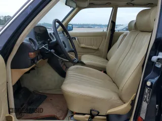 1984 Mercedes-Benz 300 with VIN WDBAB33A9EA047709, listed as a Copart auction lot 68974194 with 86,301 mi miles and Salvage Title. Bid and sale history available at carsss.com. Image 7.