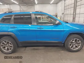 2020 Jeep Cherokee Trailhawk with VIN 1C4PJMBX6LD656570, listed as a IAAI auction lot 42399597 with 88,348 mi miles and . Bid and sale history available at DreamBid. Image 14.