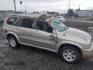 2001 Suzuki XL7 Standard z VIN JS3TX92VX14114699, wystawiony jako IAAI lot #41085552 z przebiegiem 195 316 mil mil oraz . Historia ofert i sprzedaży dostępna na DreamBid. Obrazek 6.
