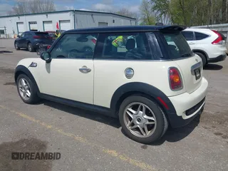 2007 MINI Hardtop S with VIN WMWMF73567TT84033, listed as a IAAI auction lot 42189573 with 75,177 mi miles and . Bid and sale history available at DreamBid. Image 3.
