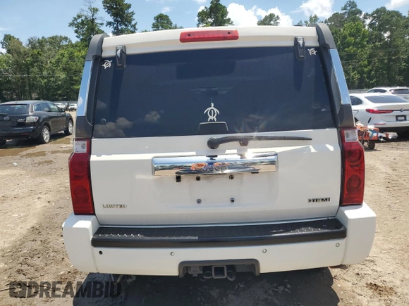 2007 Jeep Commander Limited z VIN 1J8HH582X7C507939, wystawiony jako Copart lot #64052895 z przebiegiem Nie podano mil oraz Szkoda całkowita • Salvage title. Historia ofert i sprzedaży dostępna na DreamBid. Obrazek 6.