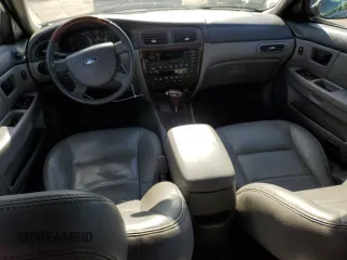 2005 Ford Taurus z VIN 1FAHP59U15A158162, wystawiony jako Copart lot #81109994 z przebiegiem 81 196 mil mil oraz Czysty tytuł • Clean title. Historia ofert i sprzedaży dostępna na DreamBid. Obrazek 8.