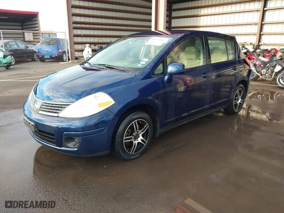 2009 Nissan Versa 1.8 S with VIN 3N1BC13E19L353170, listed as a IAAI auction lot 41493381 with 135,765 mi miles. Bid and sale history available at carsss.com. Image 17.