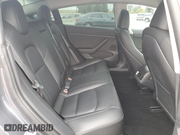 2023 Tesla Model 3 with VIN 5YJ3E1EA4PF642769, listed as a Copart auction lot 50648825 with 25,310 mi miles and Salvage title. Bid and sale history available at DreamBid. Image 11.
