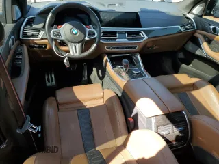2023 BMW X5 M z VIN 5YMJU0C01P9P15368, wystawiony jako Copart lot #50782505 z przebiegiem Nie podano mil oraz Szkody całkowita. Historia ofert i sprzedaży dostępna na DreamBid. Obrazek 8.