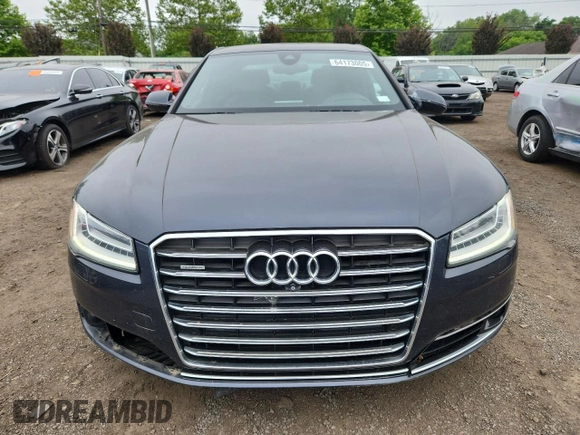 2015 Audi A8 4.0T with VIN WAUJ2AFD6FN011009, listed as a Copart auction lot 64173005 with 153,377 mi miles and Salvage title. Bid and sale history available at DreamBid. Image 5.