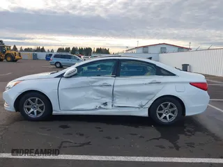 2014 Hyundai Sonata SE with VIN 5NPEC4AC5EH880717, listed as a IAAI auction lot 41275243 with 145,577 mi miles and . Bid and sale history available at DreamBid. Image 14.