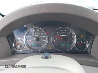 2007 Jeep Grand Cherokee Laredo z VIN 1J8GR48K57C605912, wystawiony jako IAAI lot #42323050 z przebiegiem 210 615 mil mil oraz . Historia ofert i sprzedaży dostępna na DreamBid. Obrazek 7.