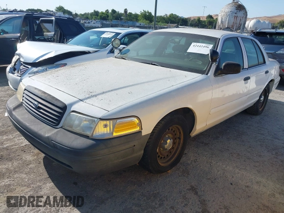 2000 Ford Crown Victoria Police Interceptor z VIN 2FAFP71W7YX104263, wystawiony jako IAAI lot #42442496 z przebiegiem 153 064 mil mil oraz . Historia ofert i sprzedaży dostępna na DreamBid. Obrazek 2.