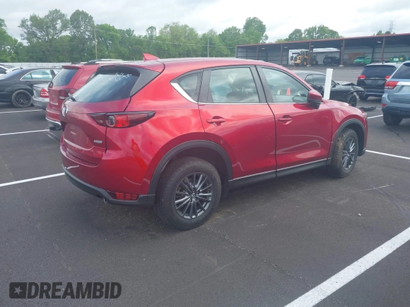 2019 Mazda CX-5 Sport with VIN JM3KFABM5K0627087, listed as a IAAI auction lot 42163866 with 38,050 mi miles and . Bid and sale history available at DreamBid. Image 4.