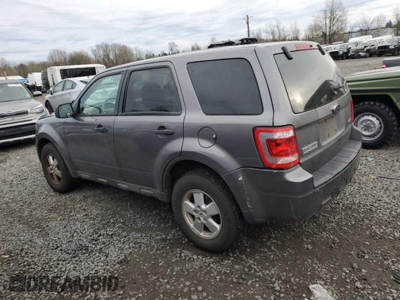 2009 Ford Escape XLS z VIN 1FMCU92759KB19563, wystawiony jako Copart lot #86012594 z przebiegiem 98 615 mil mil oraz Czysty tytuł • Clean title. Historia ofert i sprzedaży dostępna na DreamBid. Obrazek 2.