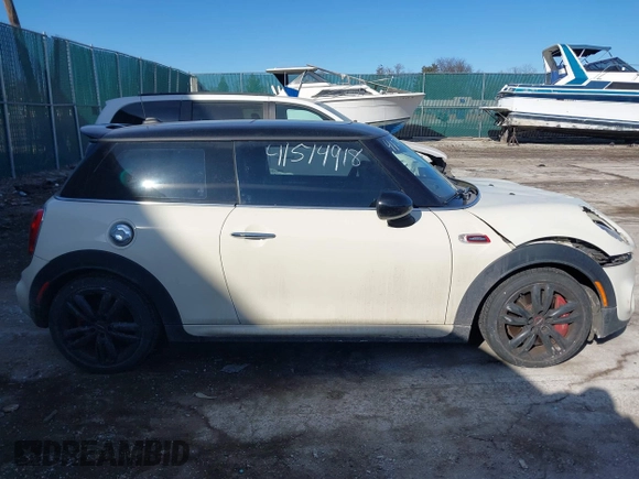 2017 MINI Hardtop John Cooper Works with VIN WMWXM9C51HT997256, listed as a IAAI auction lot 41514918 with 95,850 mi miles and . Bid and sale history available at DreamBid. Image 13.