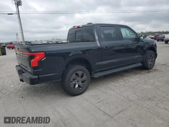 2023 Ford F-150 Lightning Pro z VIN 1FTVW1EV4PWG12935, wystawiony jako Copart lot #52685485 z przebiegiem Nie podano mil oraz Szkody całkowita. Historia ofert i sprzedaży dostępna na DreamBid. Obrazek 3.