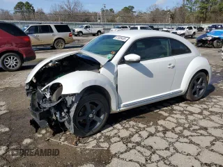 2014 Volkswagen Beetle 1.8T z VIN 3VWJ17AT1EM665073, wystawiony jako Copart lot #47805405 z przebiegiem 92 303 mil mil oraz Szkoda całkowita • Salvage title. Historia ofert i sprzedaży dostępna na DreamBid. Obrazek 1.