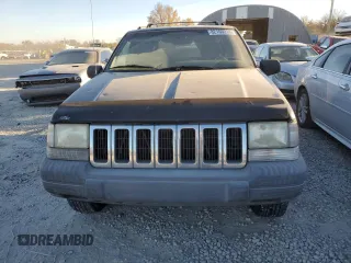 1997 Jeep Grand Cherokee Laredo with VIN 1J4GZ58S7VC685900, listed as a Copart auction lot 82105214 with 151,036 mi miles and Salvage Title. Bid and sale history available at carsss.com. Image 5.