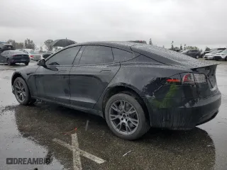2023 Tesla Model S with VIN 5YJSA1E59PF514540, listed as a Copart auction lot 45308895 with 24,165 mi miles and Salvage Title. Bid and sale history available at carsss.com. Image 2.