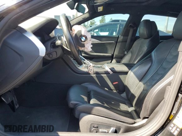 2022 BMW 8 Series M850i with VIN WBAGV8C02NCK08667, listed as a Copart auction lot 50335155 with 22,737 mi miles and Salvage title. Bid and sale history available at DreamBid. Image 7.