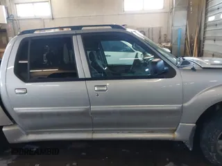 2004 Ford Explorer Sport Trac XLS z VIN 1FMZU77K84UB99207, wystawiony jako IAAI lot #41621860 z przebiegiem 126 634 mil mil oraz . Historia ofert i sprzedaży dostępna na DreamBid. Obrazek 14.