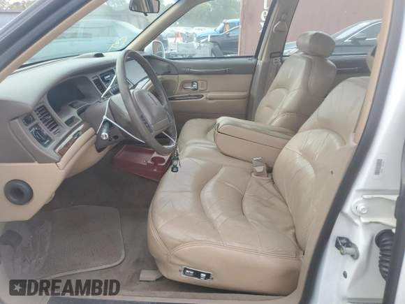 1997 Lincoln Town Car Signature z VIN 1LNLM82W2VY697709, wystawiony jako Copart lot #70506934 z przebiegiem 200 288 mil mil oraz Szkoda całkowita • Salvage title. Historia ofert i sprzedaży dostępna na DreamBid. Obrazek 7.
