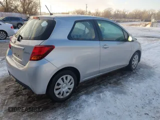 2015 Toyota Yaris L with VIN VNKJTUD36FA036518, listed as a IAAI auction lot 41233406 with 138,481 mi miles. Bid and sale history available at carsss.com. Image 4.