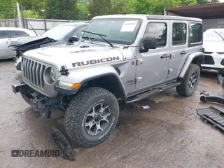 2018 Jeep Wrangler Unlimited Rubicon with VIN 1C4HJXFG4JW174603, listed as a IAAI auction lot 42202302 with 120,229 mi miles and . Bid and sale history available at DreamBid. Image 2.