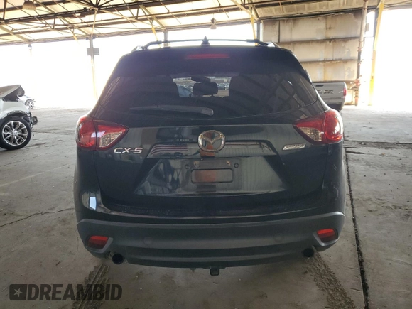 2014 Mazda CX-5 Touring with VIN JM3KE2CY4E0379574, listed as a Copart auction lot 48509655 with 178,102 mi miles and Salvage Title. Bid and sale history available at DreamBid. Image 6.