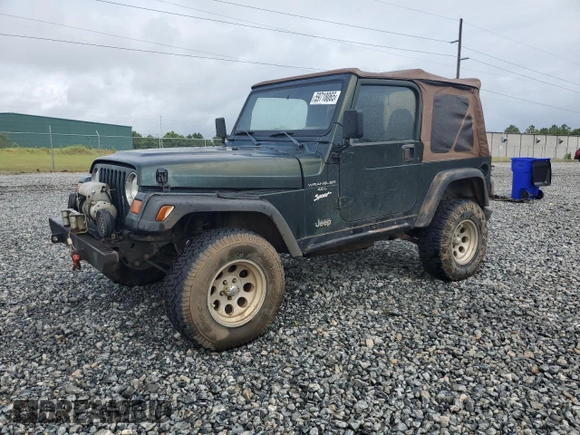 1998 Jeep Wrangler Sport with VIN 1J4FY19S5WP795781, listed as a Copart auction lot 59718065 with 208,416 mi miles and Salvage title. Bid and sale history available at DreamBid. Image 1.