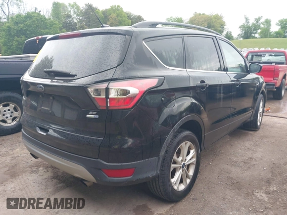 2017 Ford Escape SE with VIN 1FMCU9GD6HUB90367, listed as a IAAI auction lot 42088930 with 145,286 mi miles and . Bid and sale history available at DreamBid. Image 4.