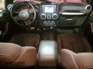 2017 Jeep Wrangler Unlimited Rubicon Recon with VIN 1C4BJWFG3HL577788, listed as a Copart auction lot 82932034 with 142,752 mi miles and Salvage title. Bid and sale history available at DreamBid. Image 8.