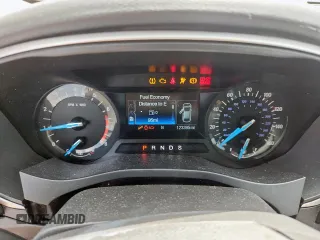 2016 Ford Fusion SE с VIN 3FA6P0H74GR113859, выставлен на аукционе Copart как лот 64133375 с пробегом 123 395 миль миль и Списание • Salvage title. История ставок и продаж доступна на DreamBid. Изображение 9.