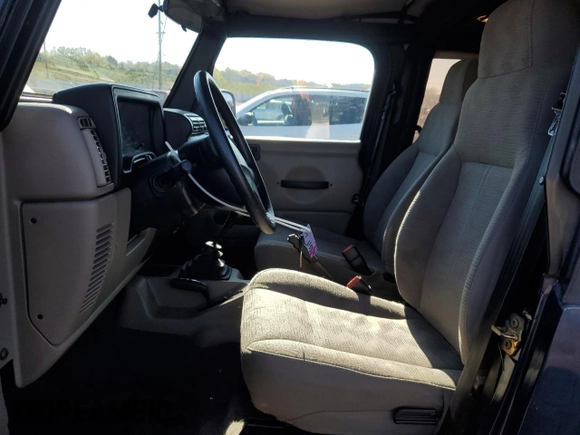 2003 Jeep Wrangler X with VIN 1J4FA39S43P338732, listed as a Copart auction lot 56315495 with 135,480 mi miles and Salvage title. Bid and sale history available at DreamBid. Image 7.