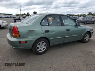 2003 Hyundai Accent GL with VIN KMHCG45CX3U497134, listed as a Copart auction lot 70932594 with 107,980 mi miles and Clean Title. Bid and sale history available at carsss.com. Image 3.