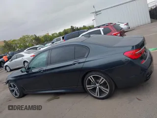 2019 BMW 7 Series 750i with VIN WBA7F0C50KGM26010, listed as a IAAI auction lot 42188421 with 71,576 mi miles and . Bid and sale history available at DreamBid. Image 15.