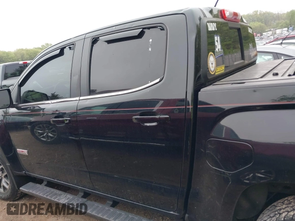 2017 GMC Canyon 4WD SLE z VIN 1GTG6CEN9H1140962, wystawiony jako IAAI lot #42251320 z przebiegiem 142 099 mil mil oraz . Historia ofert i sprzedaży dostępna na DreamBid. Obrazek 14.