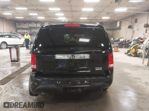 2012 Honda Pilot Touring with VIN 5FNYF4H91CB067014, listed as a IAAI auction lot 41749402 with 151,248 mi miles. Bid and sale history available at carsss.com. Image 16.