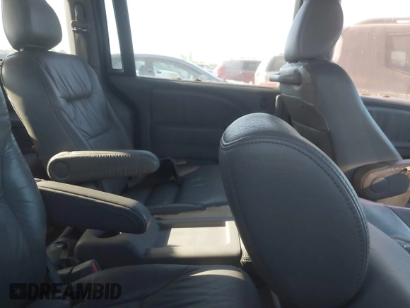 2009 Honda Odyssey EX-L with VIN 5FNRL38759B001130, listed as a IAAI auction lot 42004710 with 142,126 mi miles and . Bid and sale history available at DreamBid. Image 8.