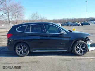 2018 BMW X1 xDrive28i with VIN WBXHT3C36J5F91110, listed as a IAAI auction lot 41757293 with 80,327 mi miles. Bid and sale history available at carsss.com. Image 13.