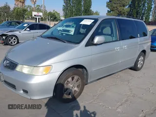 2004 Honda Odyssey EX-RES z VIN 5FNRL18864B149213, wystawiony jako IAAI lot #42227096 z przebiegiem 182 145 mil mil oraz . Historia ofert i sprzedaży dostępna na DreamBid. Obrazek 2.