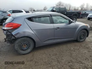 2012 Hyundai Veloster w/Black Int z VIN KMHTC6ADXCU025876, wystawiony jako Copart lot #50377835 z przebiegiem 185 181 mil mil oraz Czysty tytuł • Clean title. Historia ofert i sprzedaży dostępna na DreamBid. Obrazek 3.