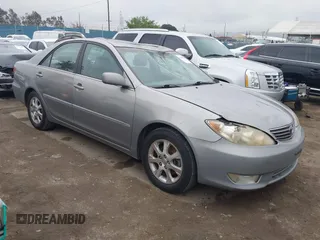 2006 Toyota Camry LE z VIN 4T1BF30K56U623427, wystawiony jako IAAI lot #42193392 z przebiegiem 171 817 mil mil oraz . Historia ofert i sprzedaży dostępna na DreamBid. Obrazek 1.
