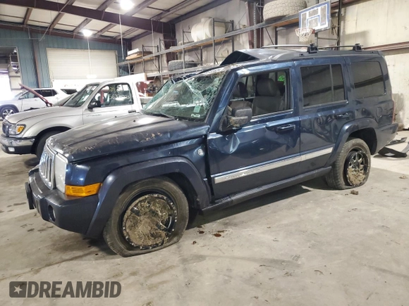 2010 Jeep Commander Sport with VIN 1J4RG4GT7AC113206, listed as a Copart auction lot 56103825 with 174,306 mi miles and Salvage title. Bid and sale history available at DreamBid. Image 1.