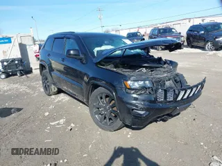2019 Jeep Grand Cherokee Laredo E with VIN 1C4RJFAG6KC661777, listed as a IAAI auction lot 41762646 with 103,547 mi miles. Bid and sale history available at carsss.com. Image 1.