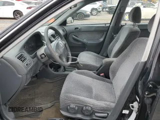 1999 Honda Civic LX with VIN 2HGEJ6677XH585273, listed as a Copart auction lot 51164635 with 184,874 mi miles and Salvage Title. Bid and sale history available at DreamBid. Image 7.