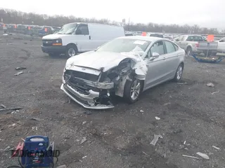 2018 Ford Fusion SE z VIN 3FA6P0HD2JR207865, wystawiony jako IAAI lot #41835895 z przebiegiem 91 069 mil mil oraz . Historia ofert i sprzedaży dostępna na DreamBid. Obrazek 17.
