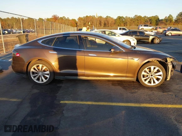 2013 Tesla Model S with VIN 5YJSA1CN7DFP22690, listed as a IAAI auction lot 40981089 with 188,057 mi miles. Bid and sale history available at carsss.com. Image 14.