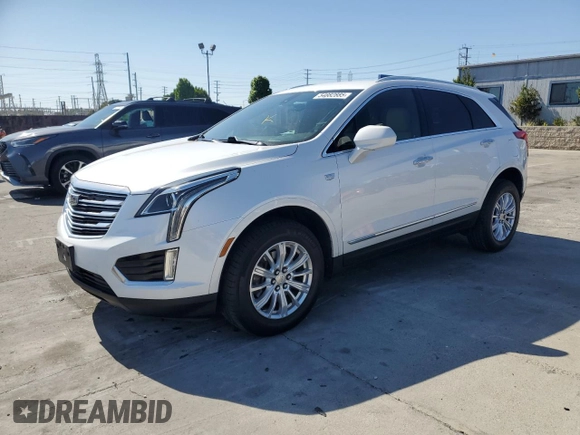 2019 Cadillac XT5 FWD with VIN 1GYKNARS1KZ121732, listed as a Copart auction lot 54882885 with 72,142 mi miles and Salvage title. Bid and sale history available at DreamBid. Image 1.