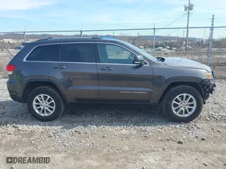 2015 Jeep Grand Cherokee Altitude with VIN 1C4RJFAG9FC796385, listed as a IAAI auction lot 41849193 with 111,739 mi miles. Bid and sale history available at carsss.com. Image 14.